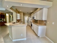 10635 Longshore Way E in Naples, FL - Building Photo - Building Photo