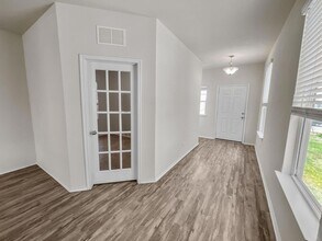 595 Eves Necklace Dr. in Mustang Ridge, TX - Building Photo - Building Photo