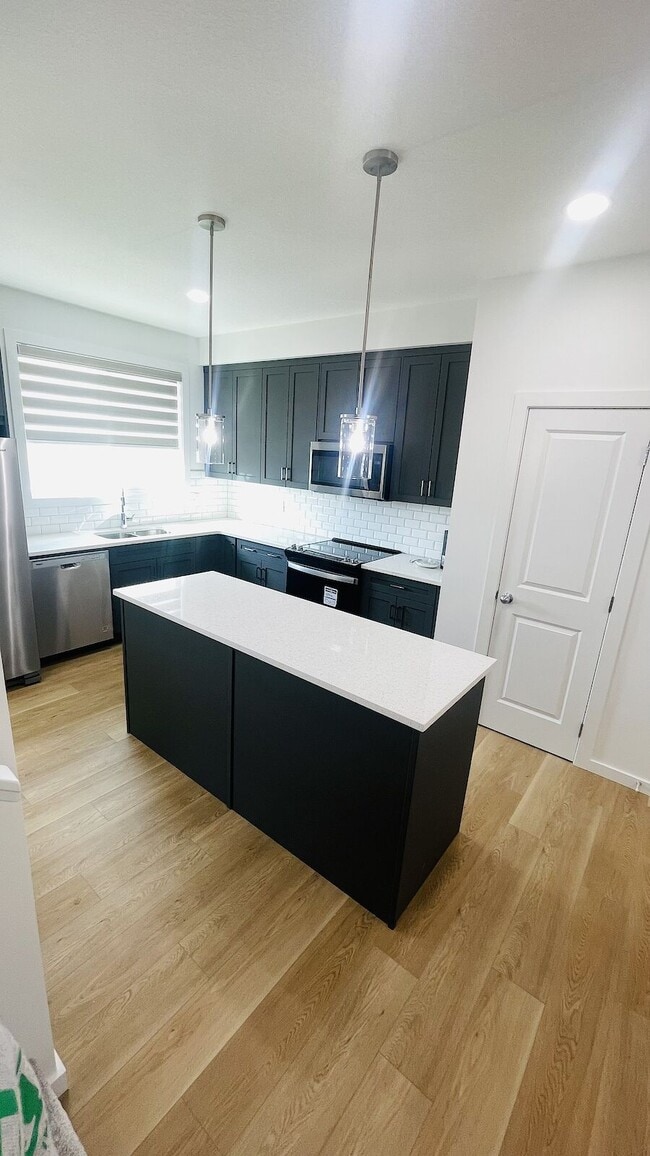 65 Belmont Drive SW in Calgary, AB - Building Photo - Building Photo