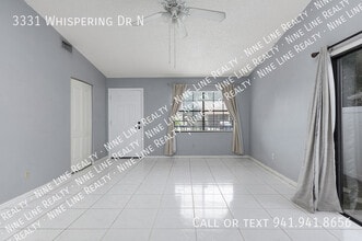 3331 Whispering Dr N in Largo, FL - Building Photo - Building Photo