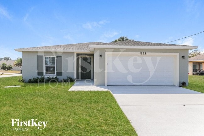 property at 1992 SW Sunglow St