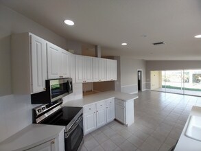 5674 Eleuthera Way in Naples, FL - Building Photo - Building Photo