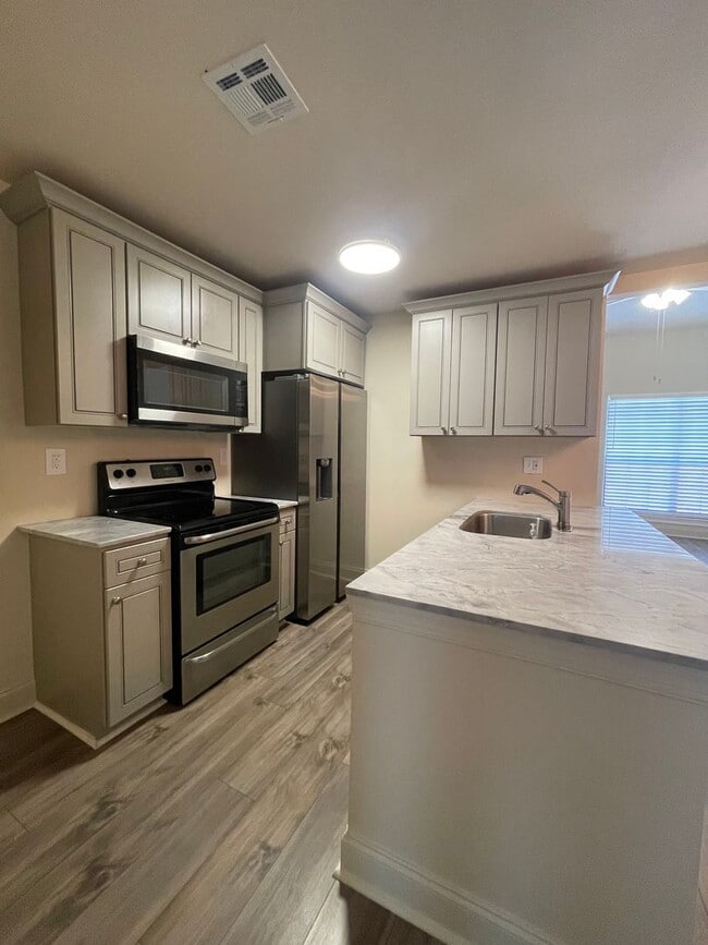 property at 208 Long Plantation Blvd