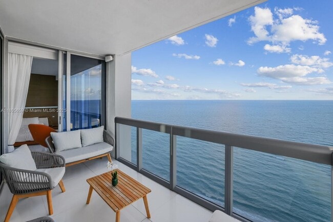 property at 6899 Collins Ave