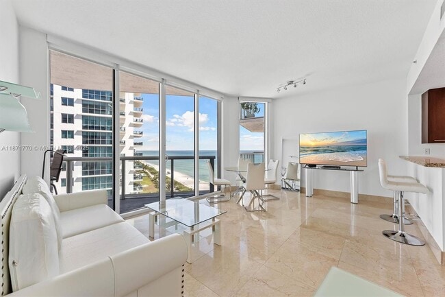 property at 6515 Collins Ave