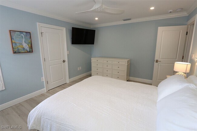 property at 6131 Pelican Bay Blvd