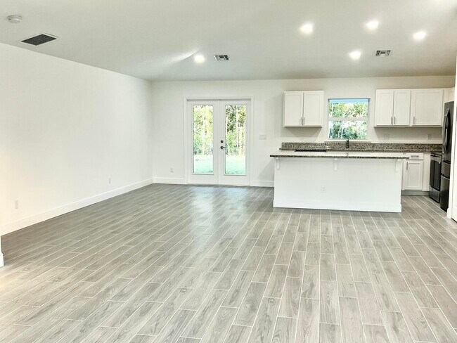 5797 NW Coosa Dr in Port St. Lucie, FL - Building Photo - Building Photo