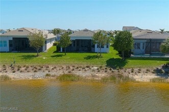 8897 Redonda Dr in Naples, FL - Foto de edificio - Building Photo