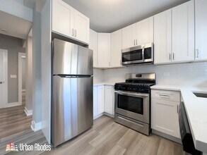 3941 N Janssen Ave, Unit A04C in Chicago, IL - Building Photo - Building Photo