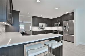 705 Neapolitan Way-Unit -705 in Naples, FL - Building Photo - Building Photo