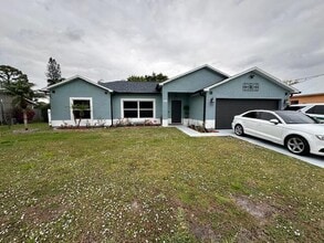 261 SW De Gouvea Terrace in Port St. Lucie, FL - Building Photo - Building Photo