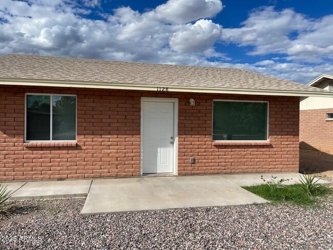 property at 1128 E 23rd St