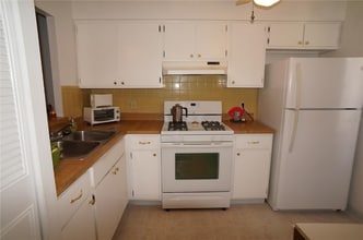 1406 Arrowhead Cir W in Clearwater, FL - Foto de edificio - Building Photo