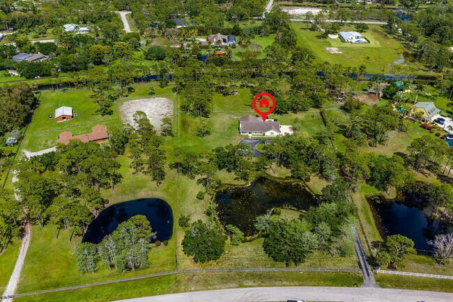 5562 Reynolds Rd in Wellington, FL - Building Photo - Building Photo