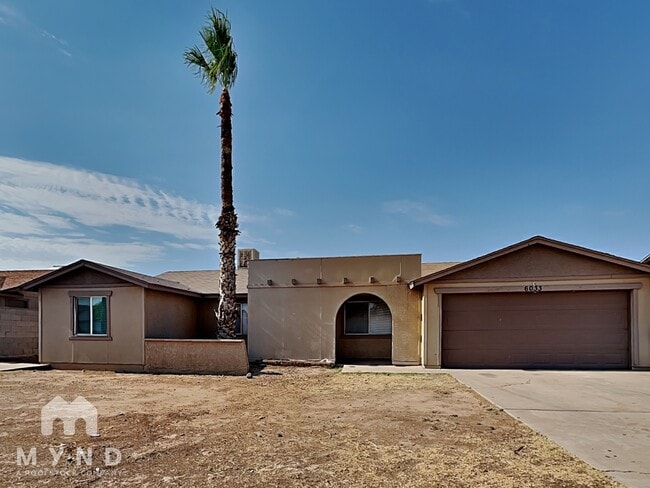property at 6033 W Vernon Ave