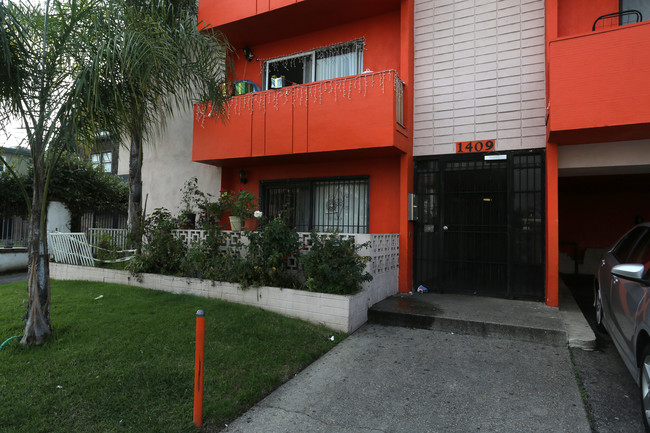 1409 S Manhattan Pl in Los Angeles, CA - Foto de edificio - Building Photo