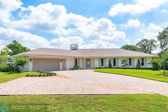 6148 NW 74th Terrace in Parkland, FL - Building Photo - Building Photo