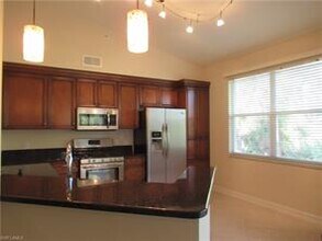 1886 Tarpon Bay Dr S-Unit -1-304 in Naples, FL - Building Photo - Building Photo