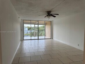 1831 Sabal Palm Dr, Unit 403 in Davie, FL - Building Photo - Building Photo