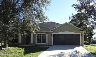 895 Brookson Ave NW in Palm Bay, FL - Building Photo