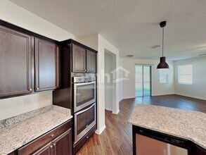 5116 Piazza Loop in Magnolia Square, FL - Building Photo - Building Photo