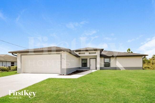 915 Plumosa Ave in Lehigh Acres, FL - Foto de edificio - Building Photo