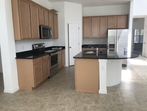 12917 Westside Vlg Lp in Windermere, FL - Building Photo - Building Photo