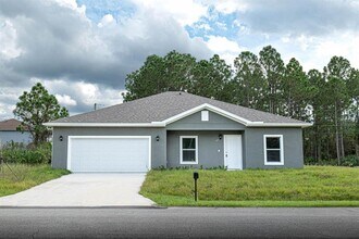 990 Quaker St SE in Palm Bay, FL - Building Photo - Building Photo