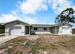 2704 Owen Ave S in Lehigh Acres, FL - Building Photo - Building Photo