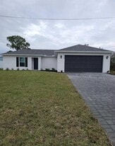 2409 NE 7th Pl in Cape Coral, FL - Building Photo