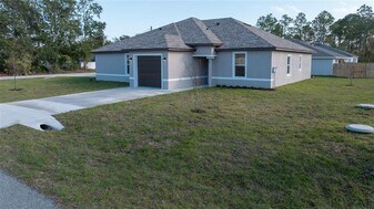2 Rainbow Ln in Palm Coast, FL - Building Photo