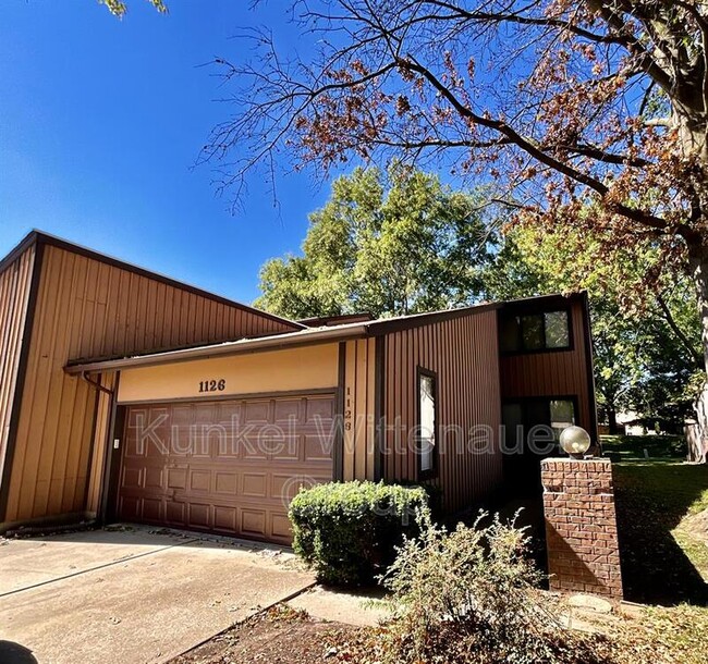 property at 1126 Woodgate Dr