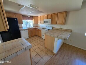 6037 W Zoe Ella Way in Glendale, AZ - Building Photo - Building Photo