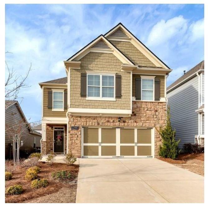 6590 Trailblazer Rd in Flowery Branch, GA - Building Photo