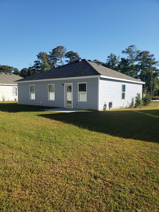 1886 Whispering Pine St SW in Ocean Isle Beach, NC - Building Photo - Building Photo
