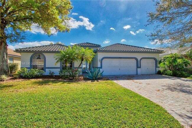 property at 5984 NW 74th St