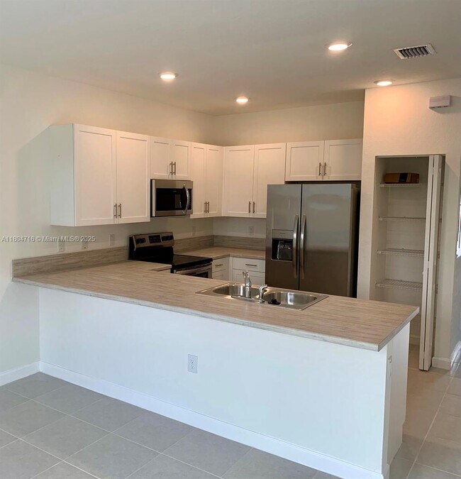 property at 21025 NE 8th Ave