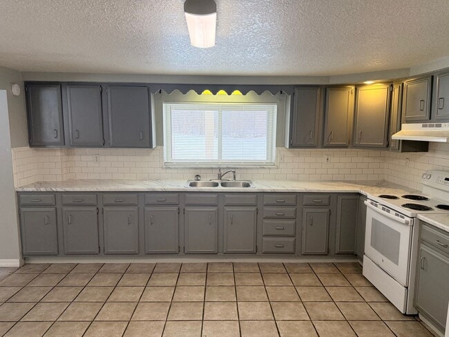 property at 10016-10020 Austin Rd