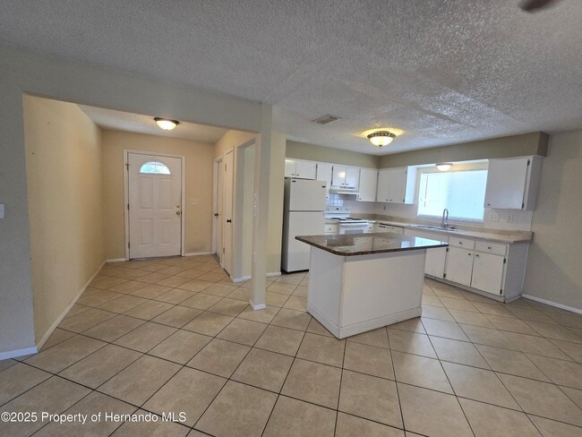 8915 Woodmill Dr in Hudson, FL - Building Photo - Building Photo