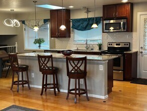 12828 W Adriatic Ave in Lakewood, CO - Building Photo - Building Photo