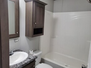 80 Elm in Highland, MI - Building Photo - Building Photo