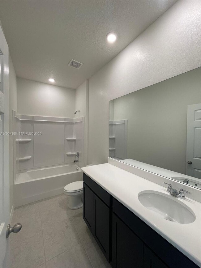 2133 SE Flanders Rd in Port St. Lucie, FL - Building Photo - Building Photo