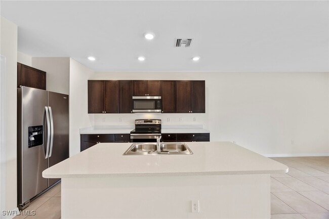 15484 Wildflower Cir in Naples, FL - Building Photo - Building Photo