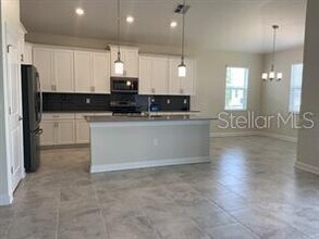 1488 Olympic Club Blvd in Four Corners, FL - Building Photo - Building Photo