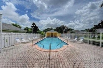 5788 Woodland Point Dr in Tamarac, FL - Building Photo - Building Photo