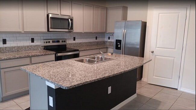 property at 16608 Maude Dr