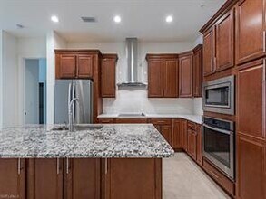 21450 Strada Nuova Circle-Unit -A204 in Estero, FL - Building Photo - Building Photo