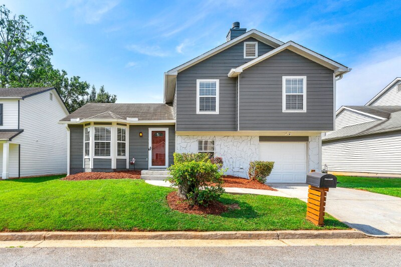 1241 To Lani Farm Rd in Stone Mountain, GA - Building Photo