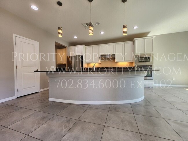 7170 Cotton Bluff St in Las Vegas, NV - Building Photo - Building Photo