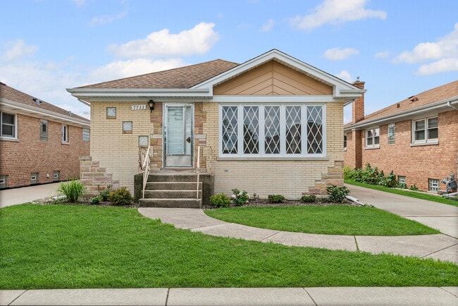 property at 7733 W Wilson Ave